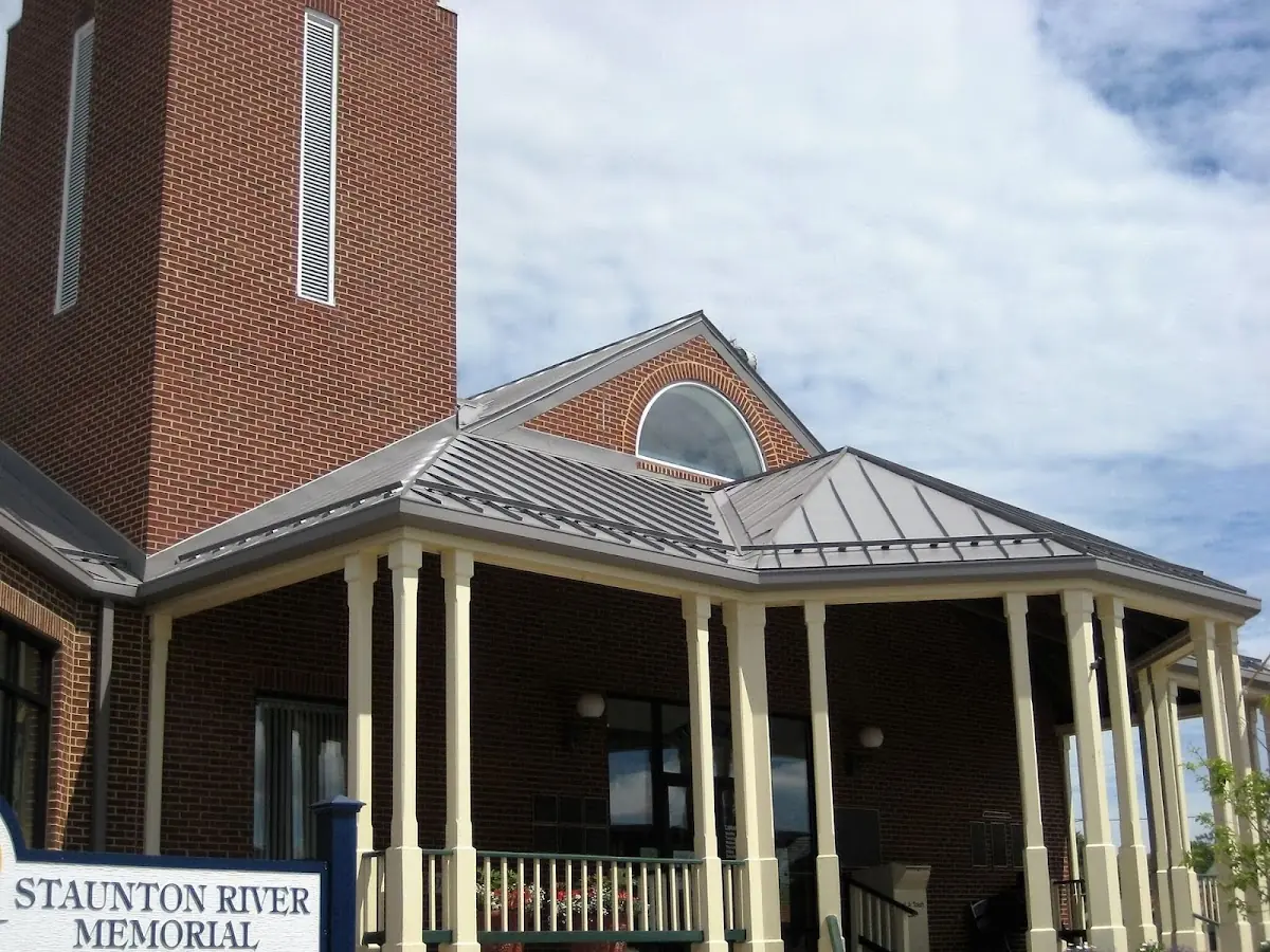 Skilled roofing craftsmen working on a residential roof in Hattontown